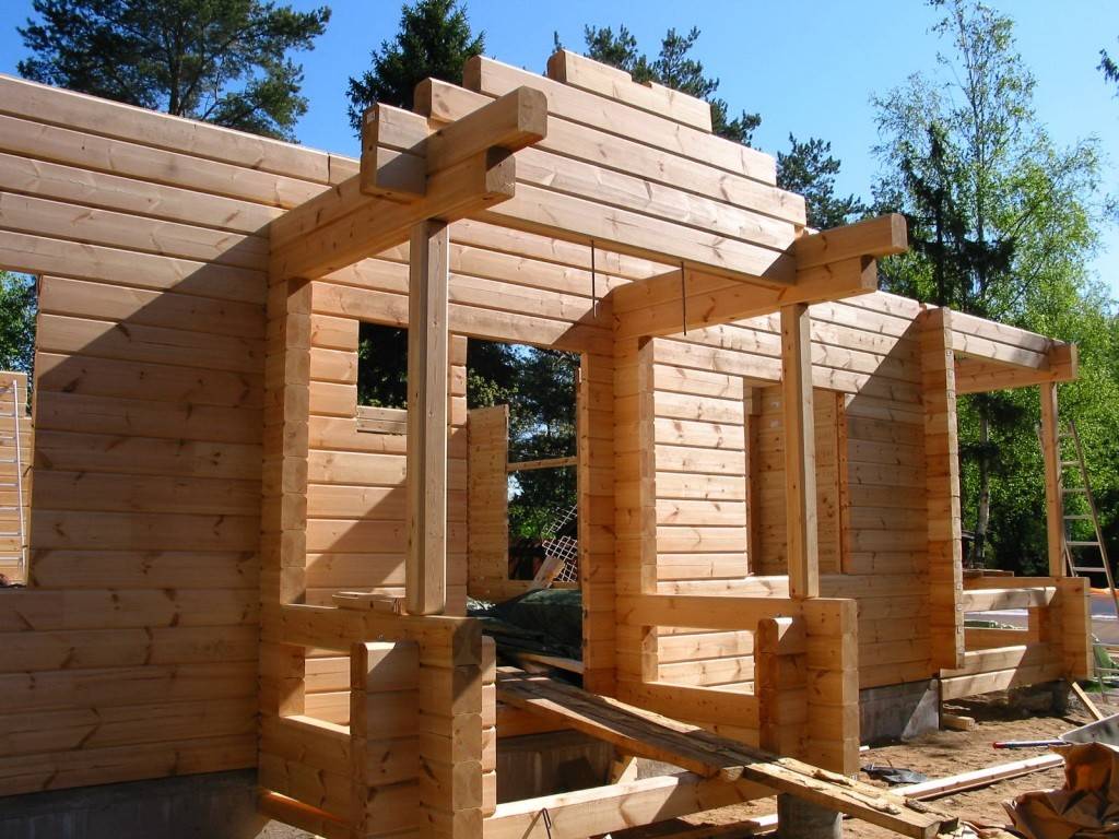 Деревянные дома из бруса — особенности строительства и виды бруса